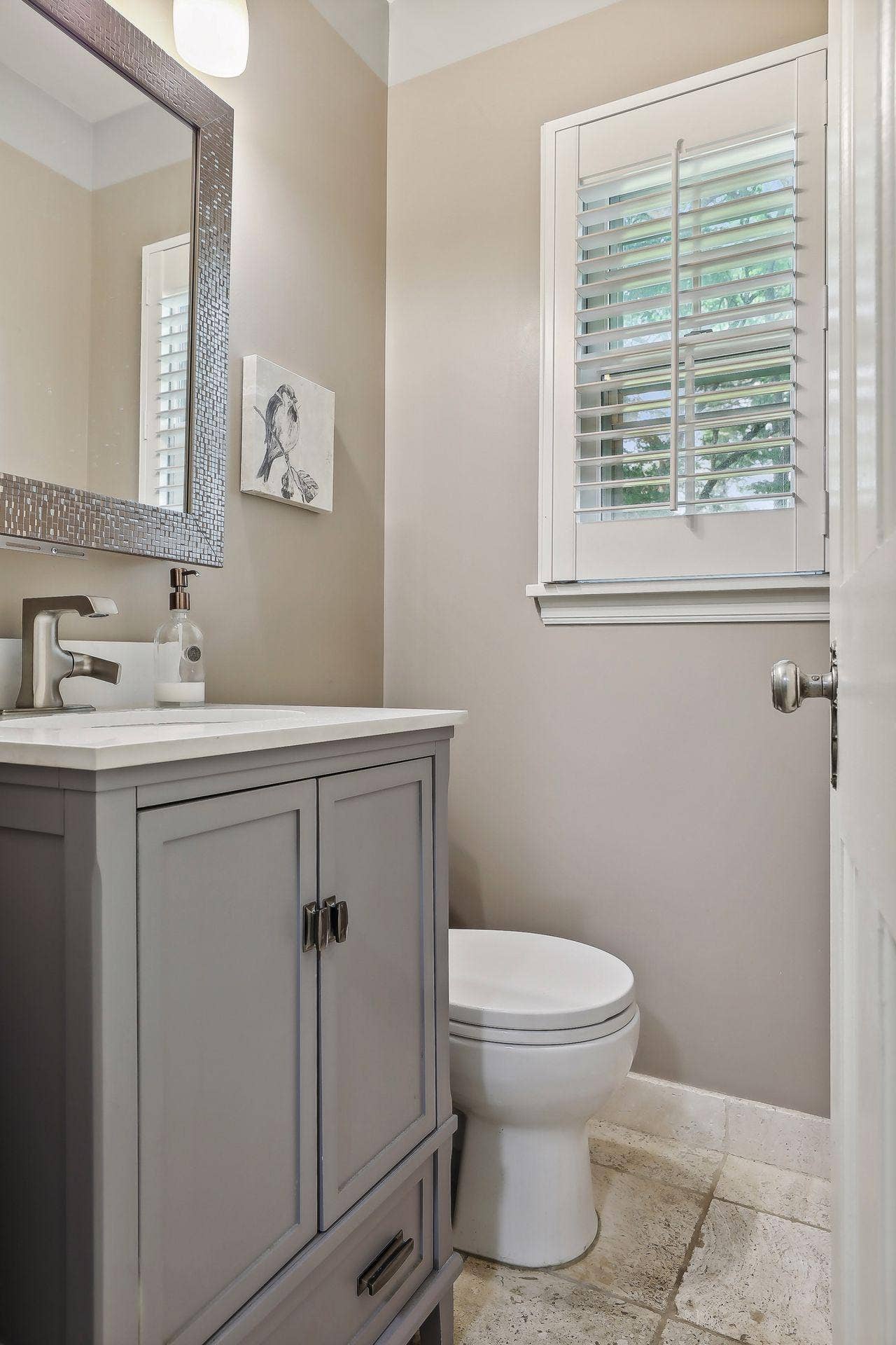 Main-floor half bathroom.