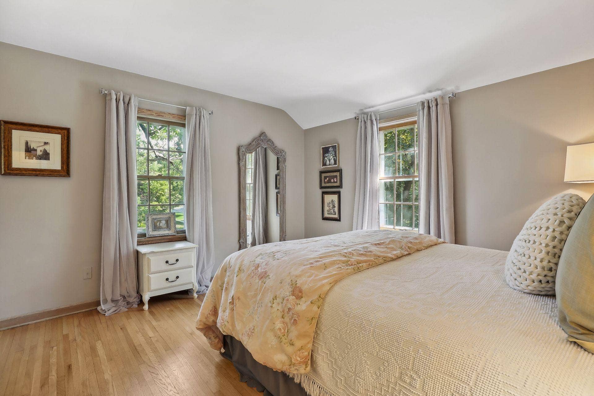 One of four upper-level bedrooms.