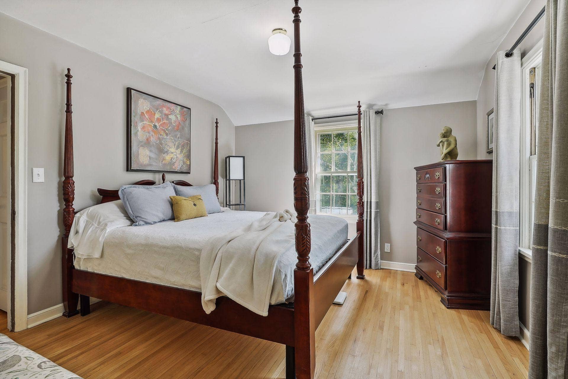 One of four upper-level bedrooms.