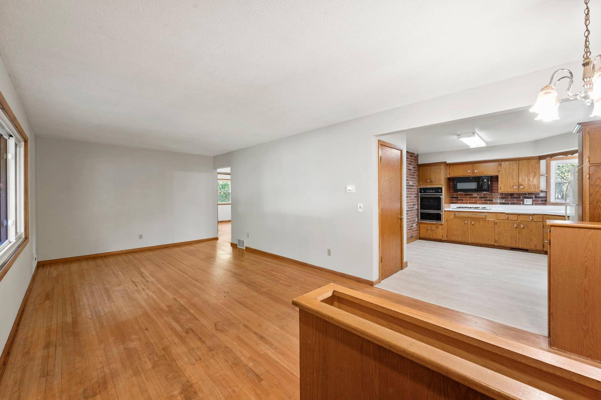 6609 74th Avenue N, Brooklyn Park, MN 55428 The surprisingly open floor plan feels spacious and connected, with the living and dining areas flowing naturally into the eat-in kitchen. The kitchen has new LVP tile flooring.