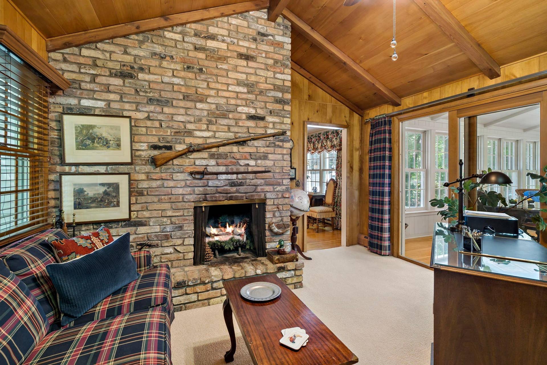 1330 Urbandale Lane N, Plymouth, MN 55447 Wood burning fireplace and floor to ceiling brick surround