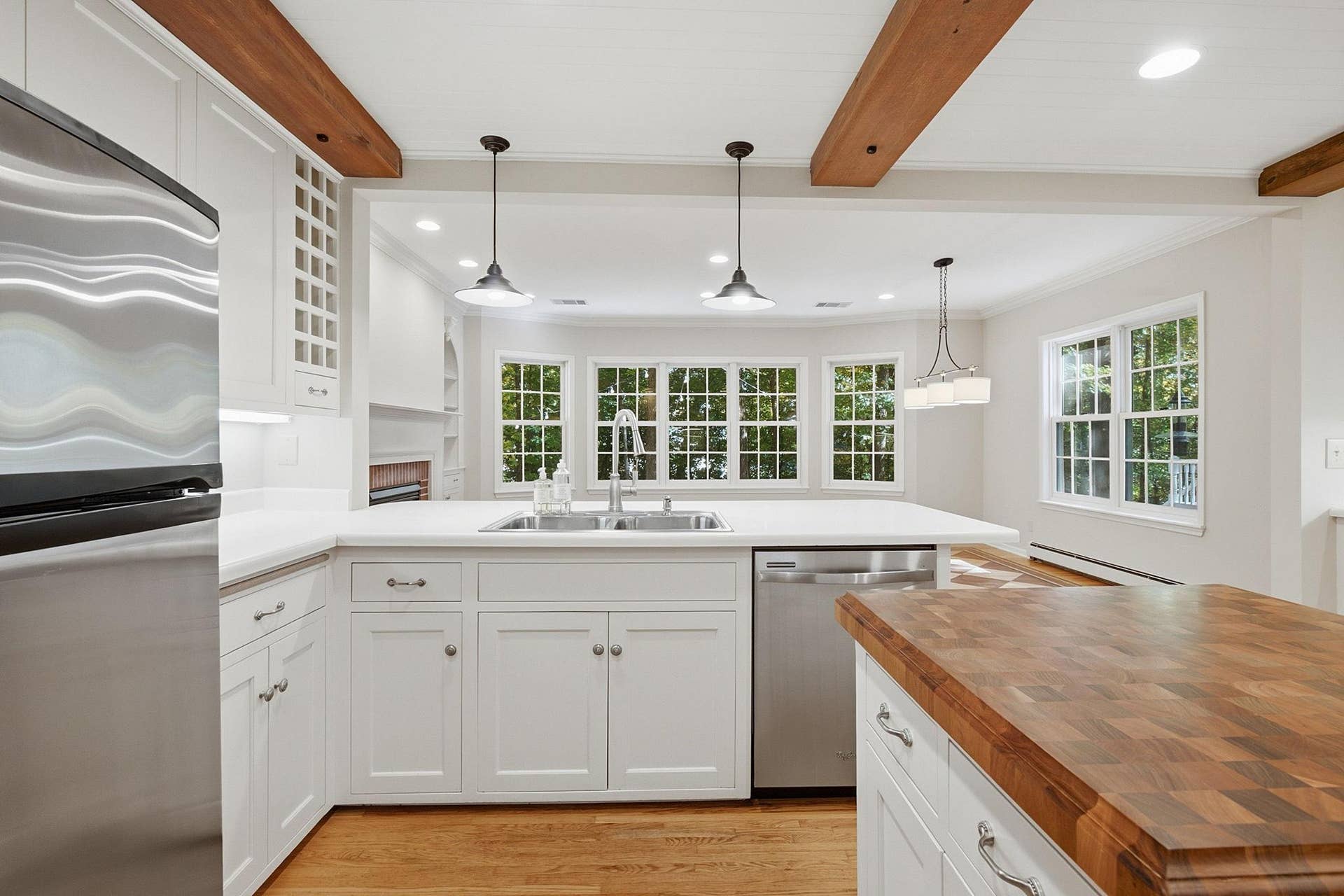 1330 Urbandale Lane N, Plymouth, MN 55447 Freshly painted main living areas showcase the stunning exposed beams and charming design details