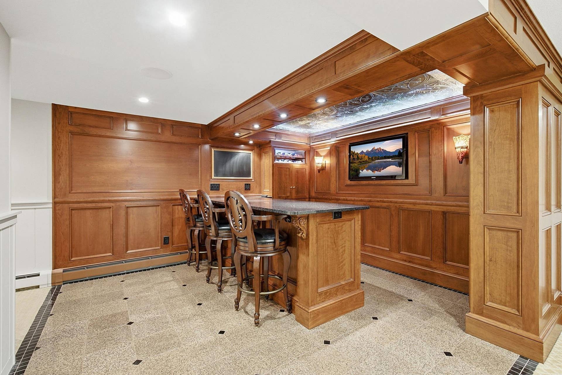 1330 Urbandale Lane N, Plymouth, MN 55447 Lower level Irish Pub Bar with bar seating and intricate ceiling details