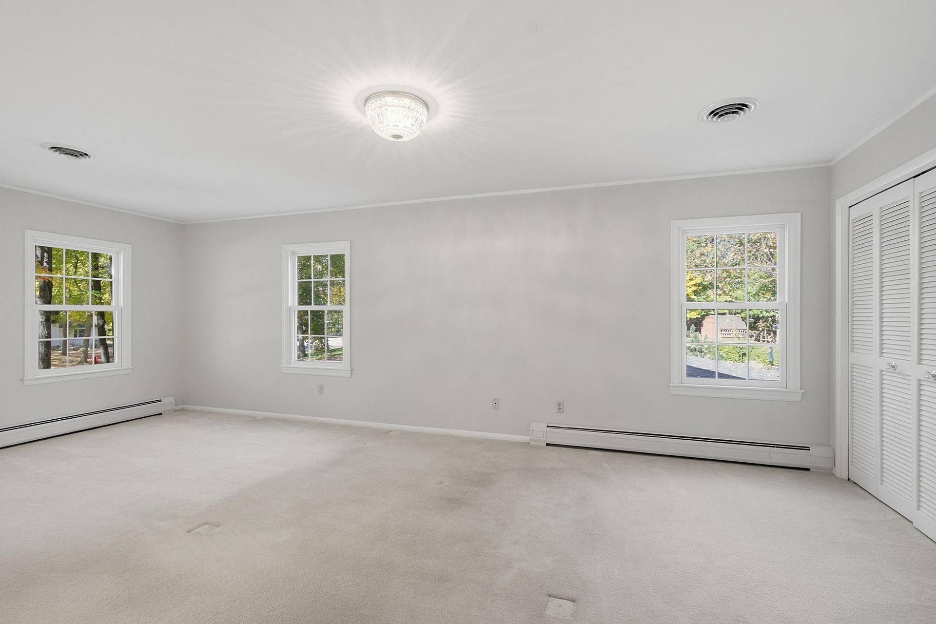 1330 Urbandale Lane N, Plymouth, MN 55447 Corner primary bedroom is filled with natural light
