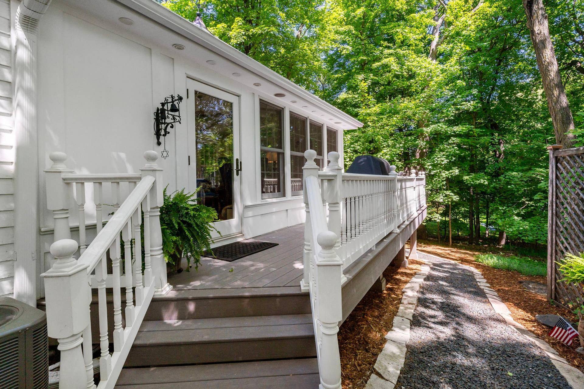1330 Urbandale Lane N, Plymouth, MN 55447 Step out of the sun room to the deck