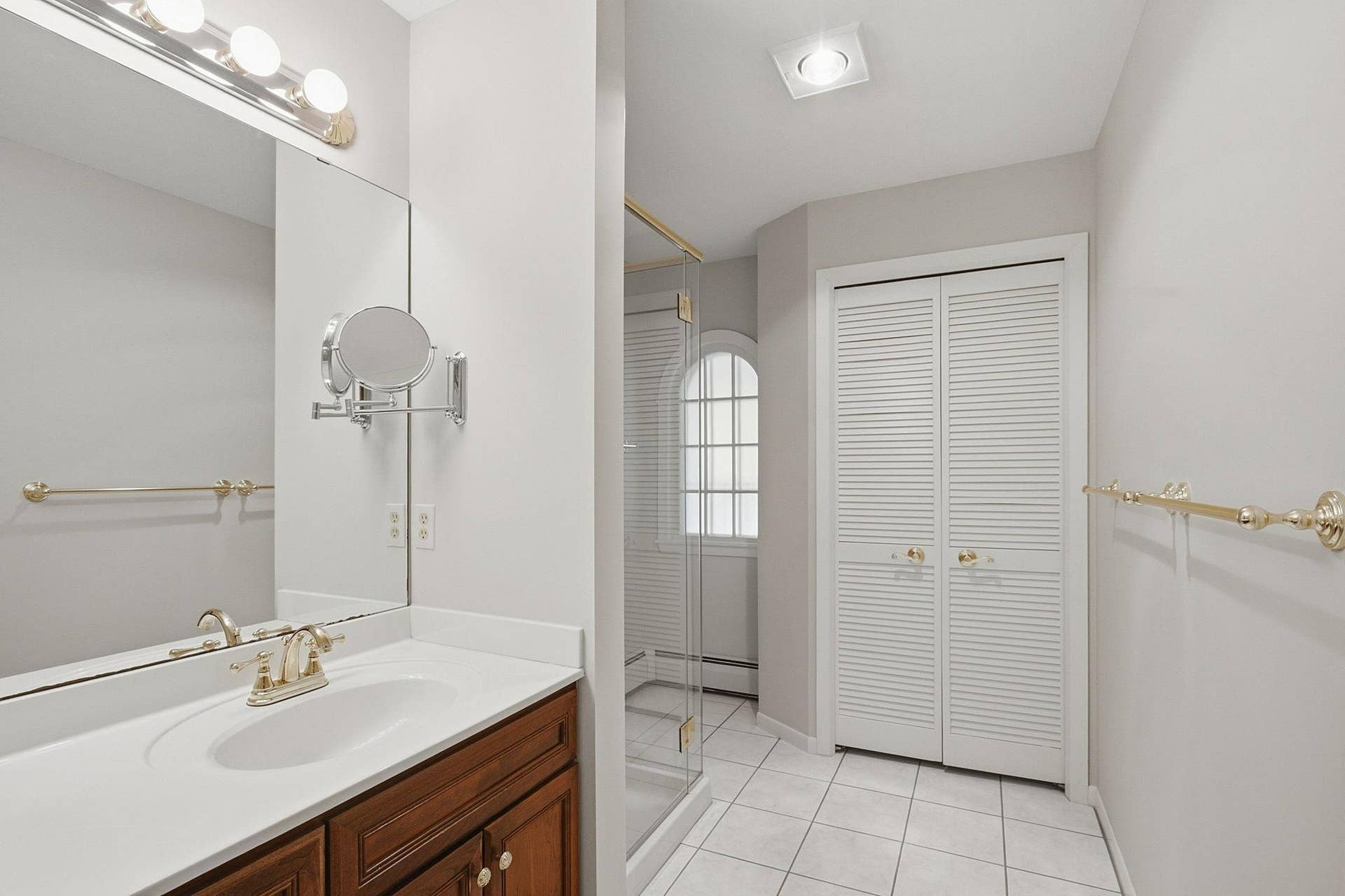 1330 Urbandale Lane N, Plymouth, MN 55447 Linen closet for storage in the primary bath