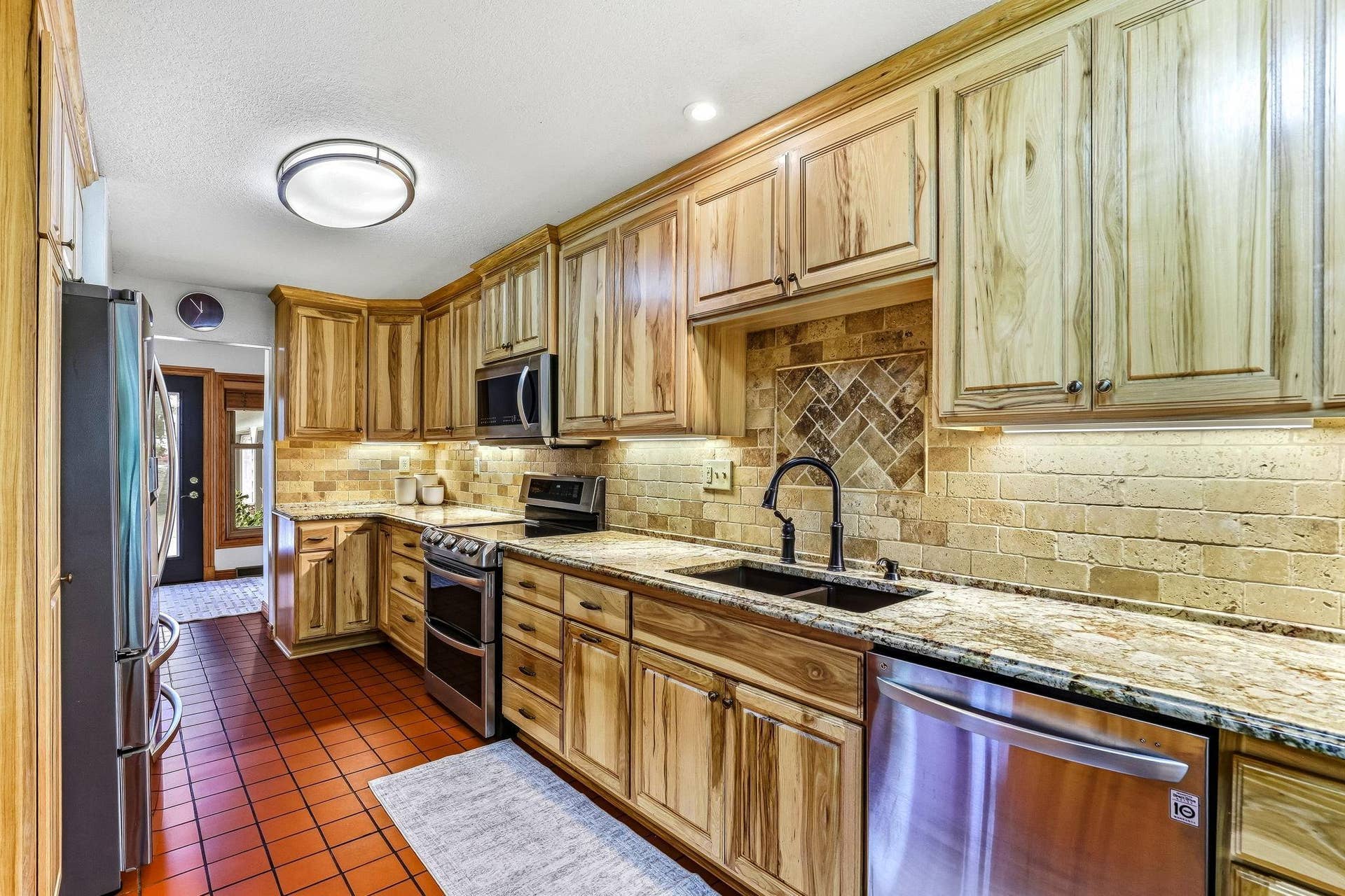 1401 Omaha Avenue N, Stillwater, MN 55082 Kitchen remodeled with Hickory cabinets and Granite countertops. Appliances replaced as well.
