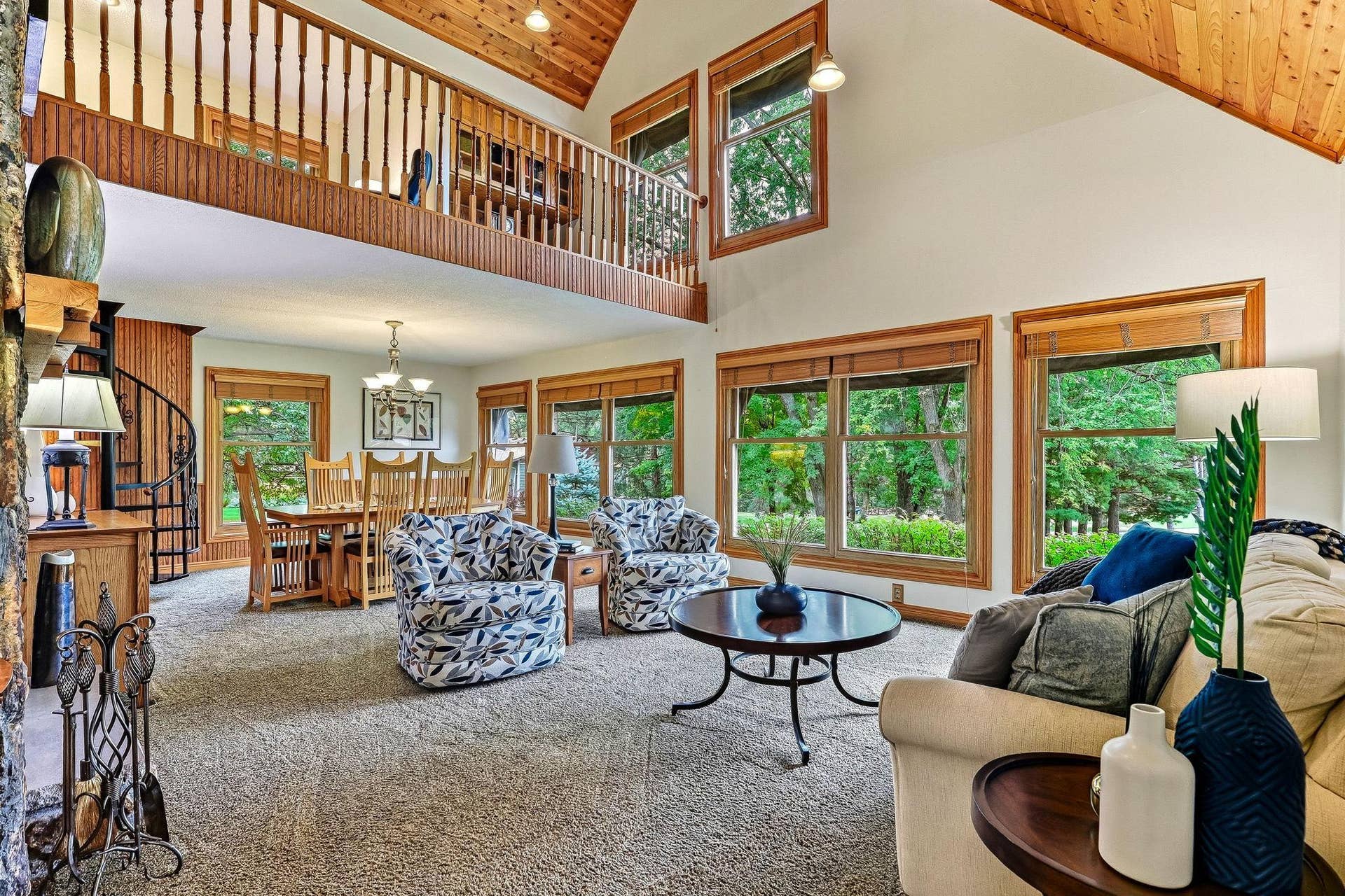 1401 Omaha Avenue N, Stillwater, MN 55082 Living and dining area with fireplace and loft above.