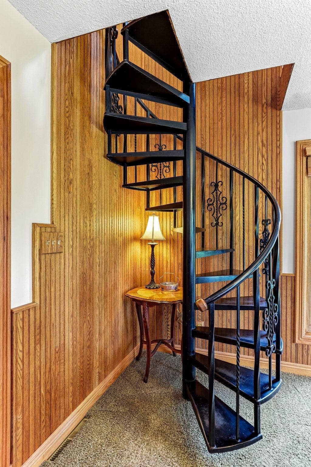 1401 Omaha Avenue N, Stillwater, MN 55082 secondary stairs to loft area. Spiral staircase.