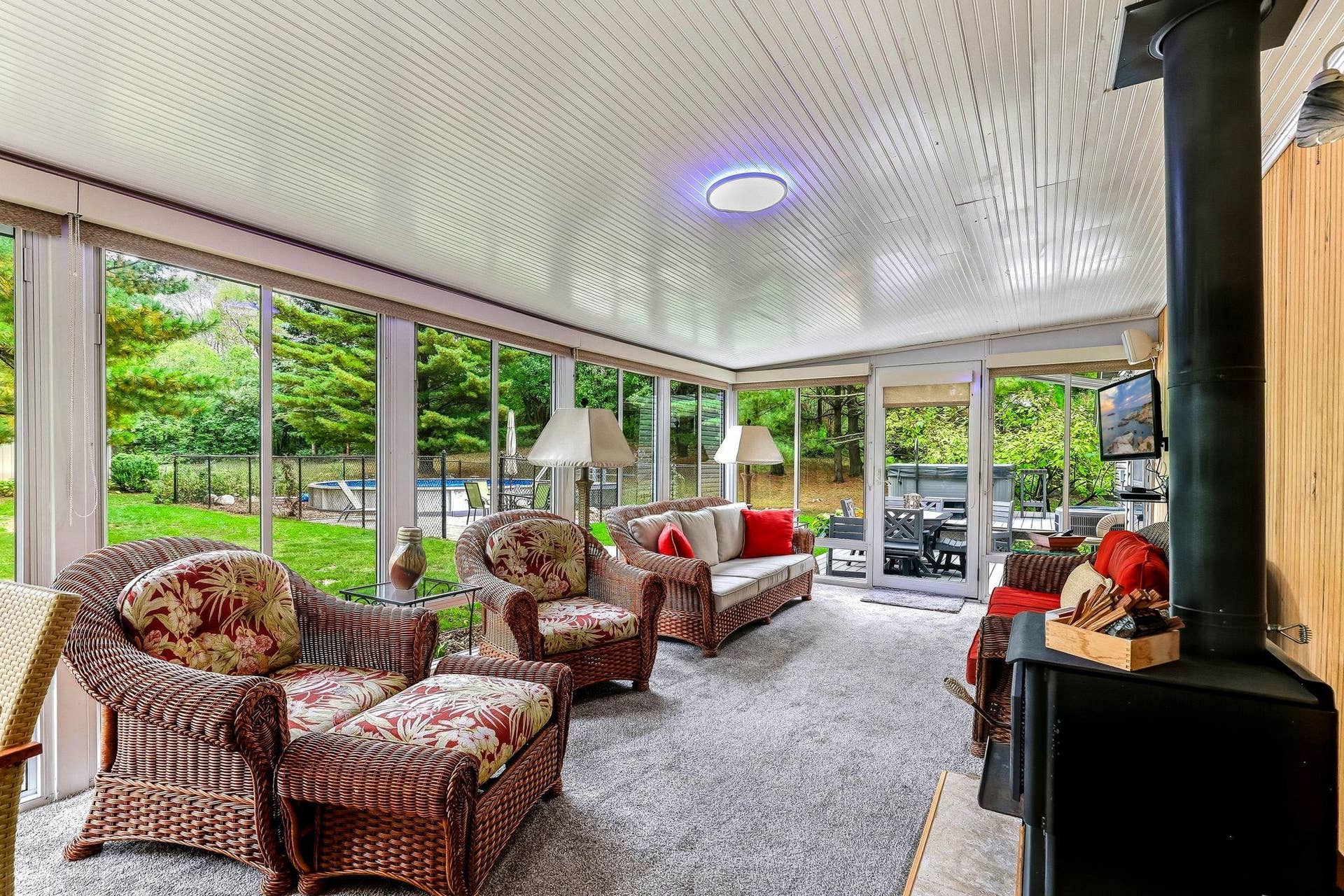 1401 Omaha Avenue N, Stillwater, MN 55082 3 season porch with fireplace. Great gathering space looking over private back yard.