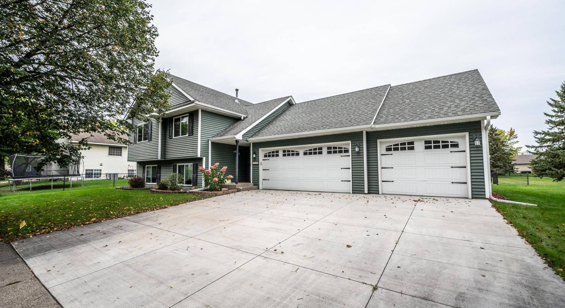 1107 Walnut Street, Farmington, MN 55024 037-010-Front of Home-4200x2289.jpg