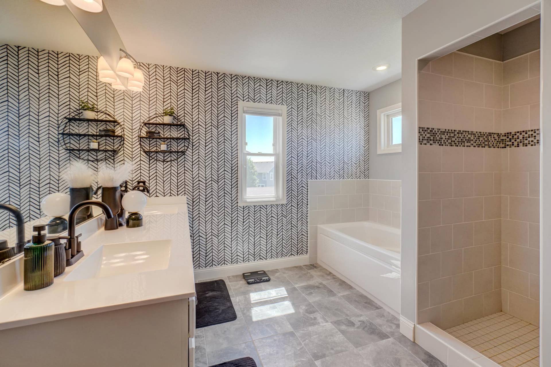 The spa-inspired primary bath offers a peaceful escape with beautiful finishes and thoughtful design