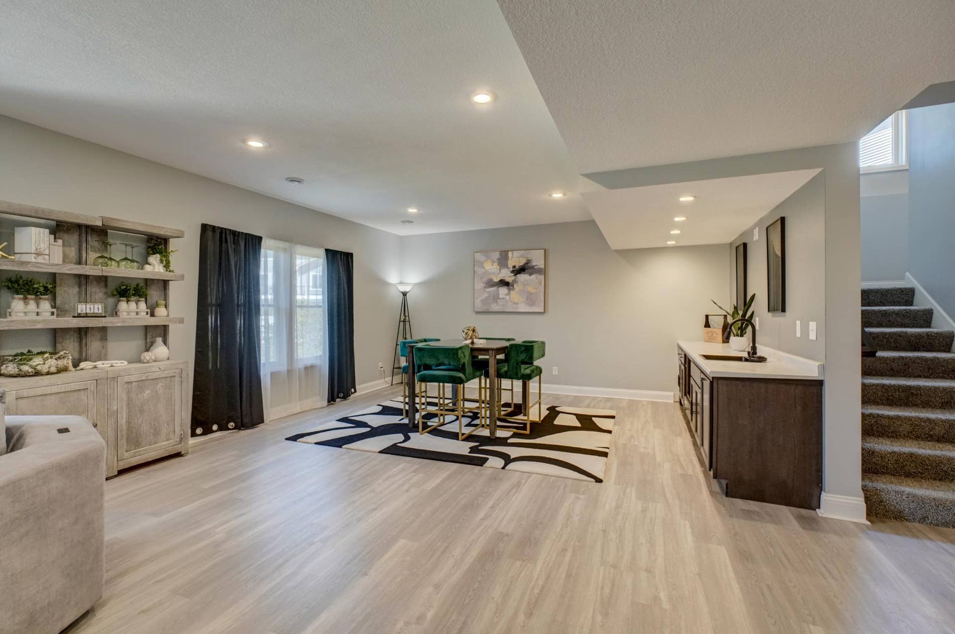 Designed for comfort and entertaining, this spacious lower level offers endless possibilities with the luxury of heated floors!