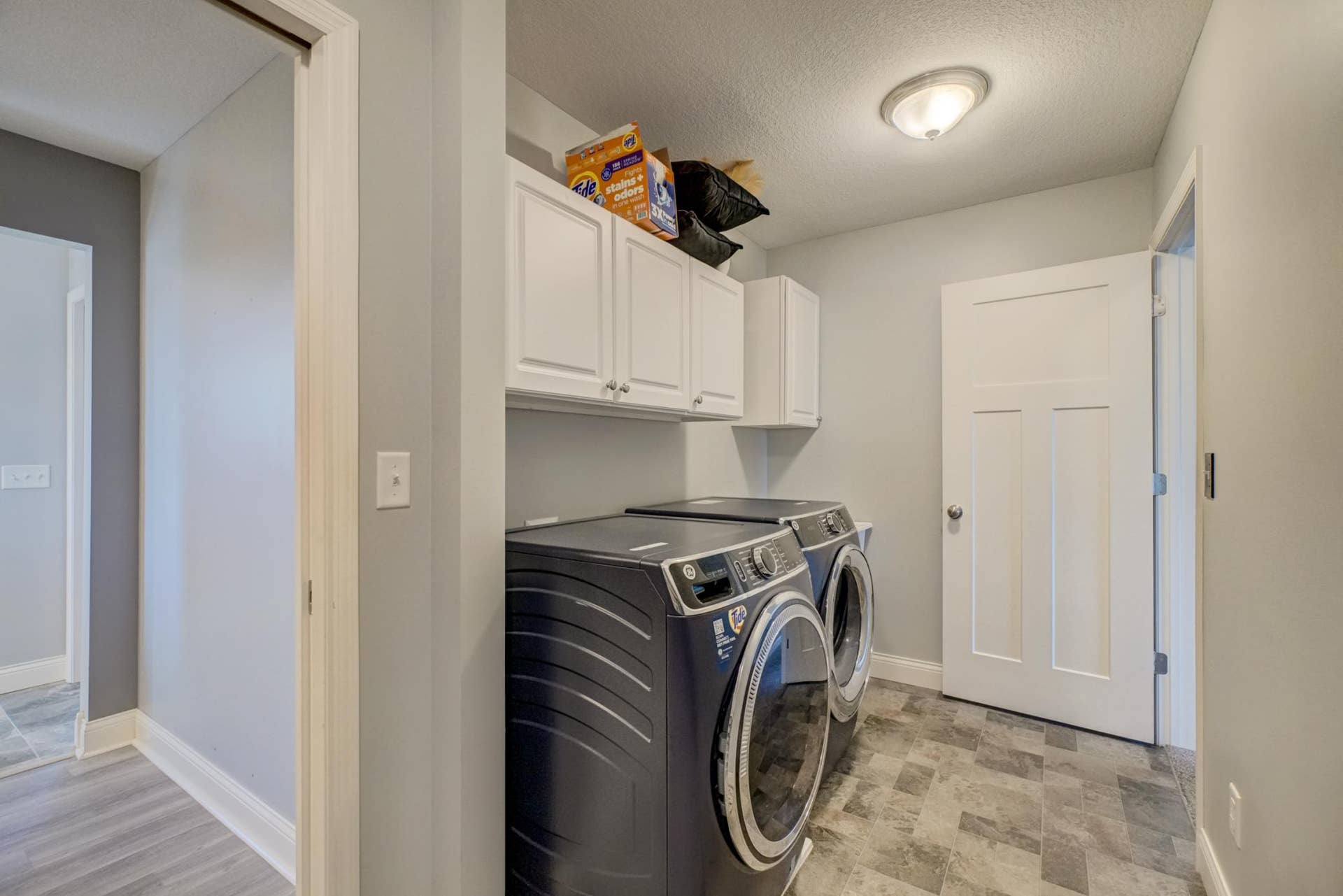 Well-appointed upper-level laundry making everyday living even easier!