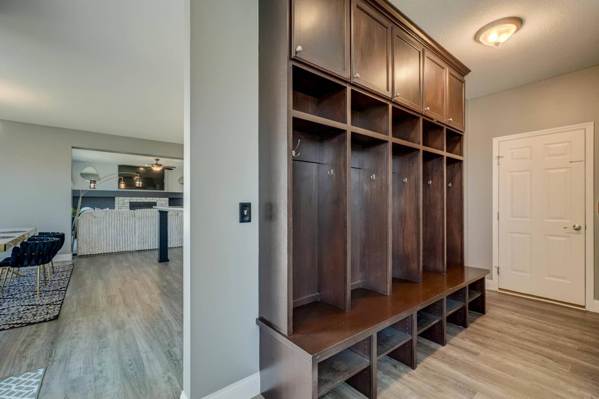 Functional mudroom seamlessly connects to a hidden pantry and built-in command center for effortless everyday living!