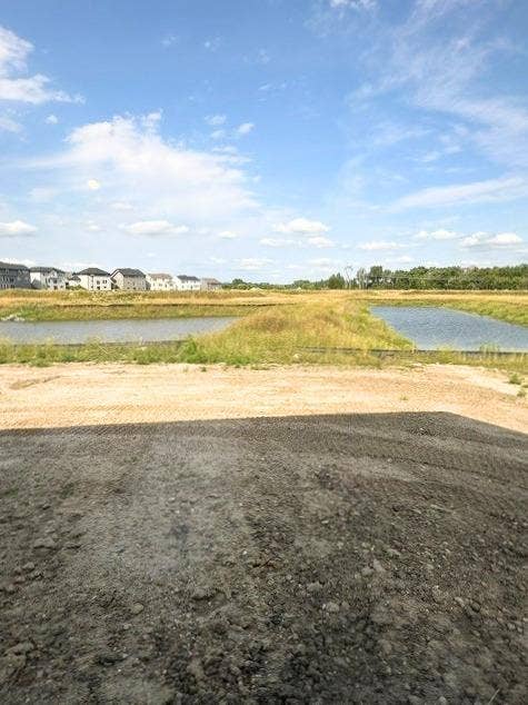 Absolutely stunning walkout site backing up to two ponds located on over .25 acres!