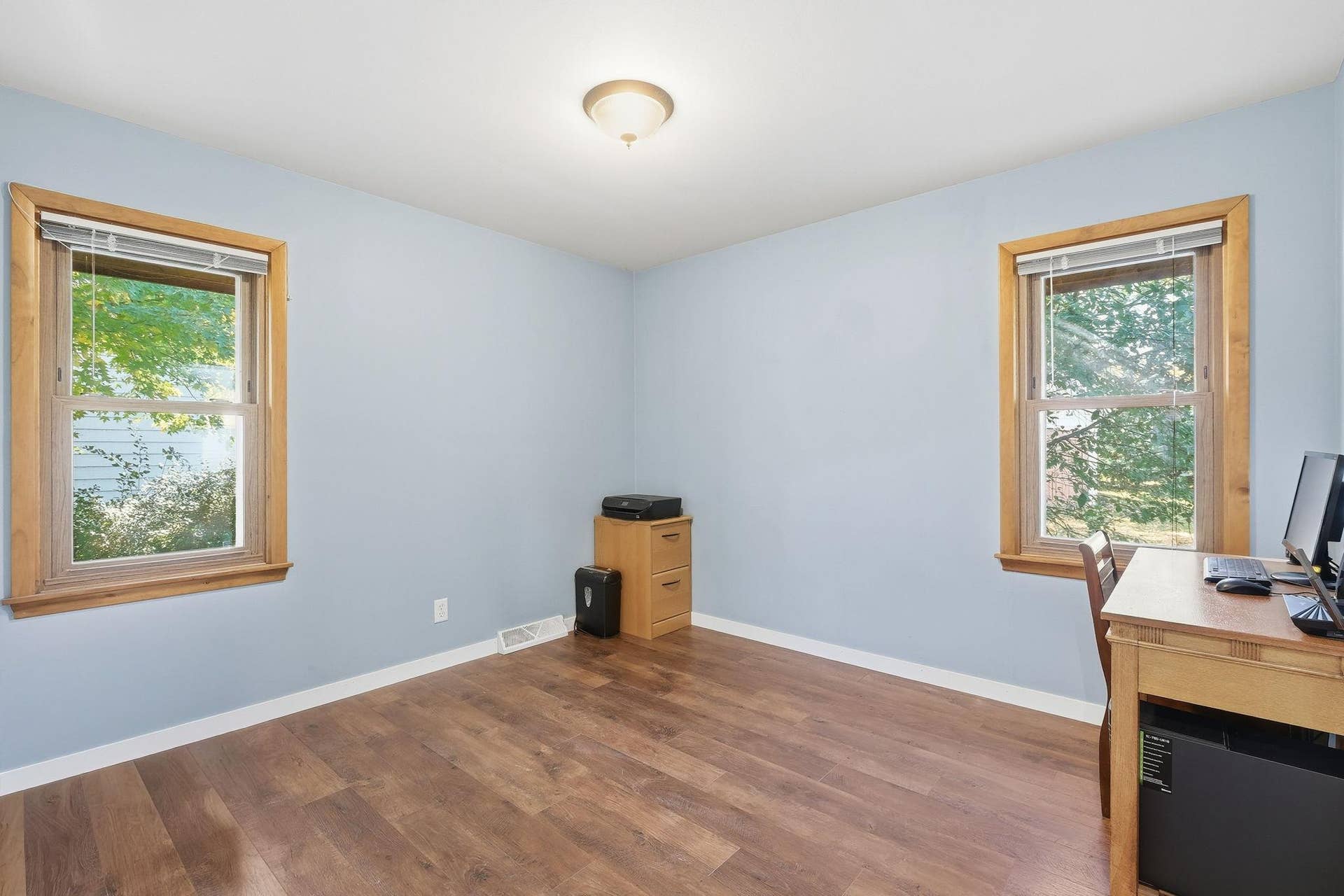 611 Central Avenue, Buffalo, MN 55313 2nd main floor bedroom also includes nice vinyl flooring.