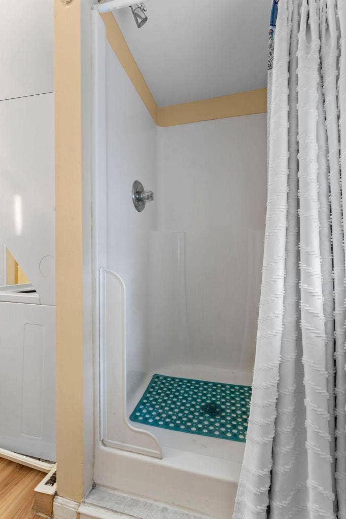 2174 8th Street, White Bear Lake, MN 55110 Upper level full bathroom with a separate tub and shower