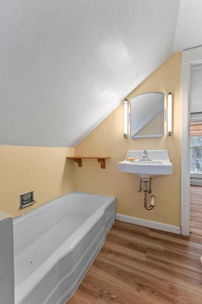2174 8th Street, White Bear Lake, MN 55110 Upper level full bathroom with a separate tub and shower