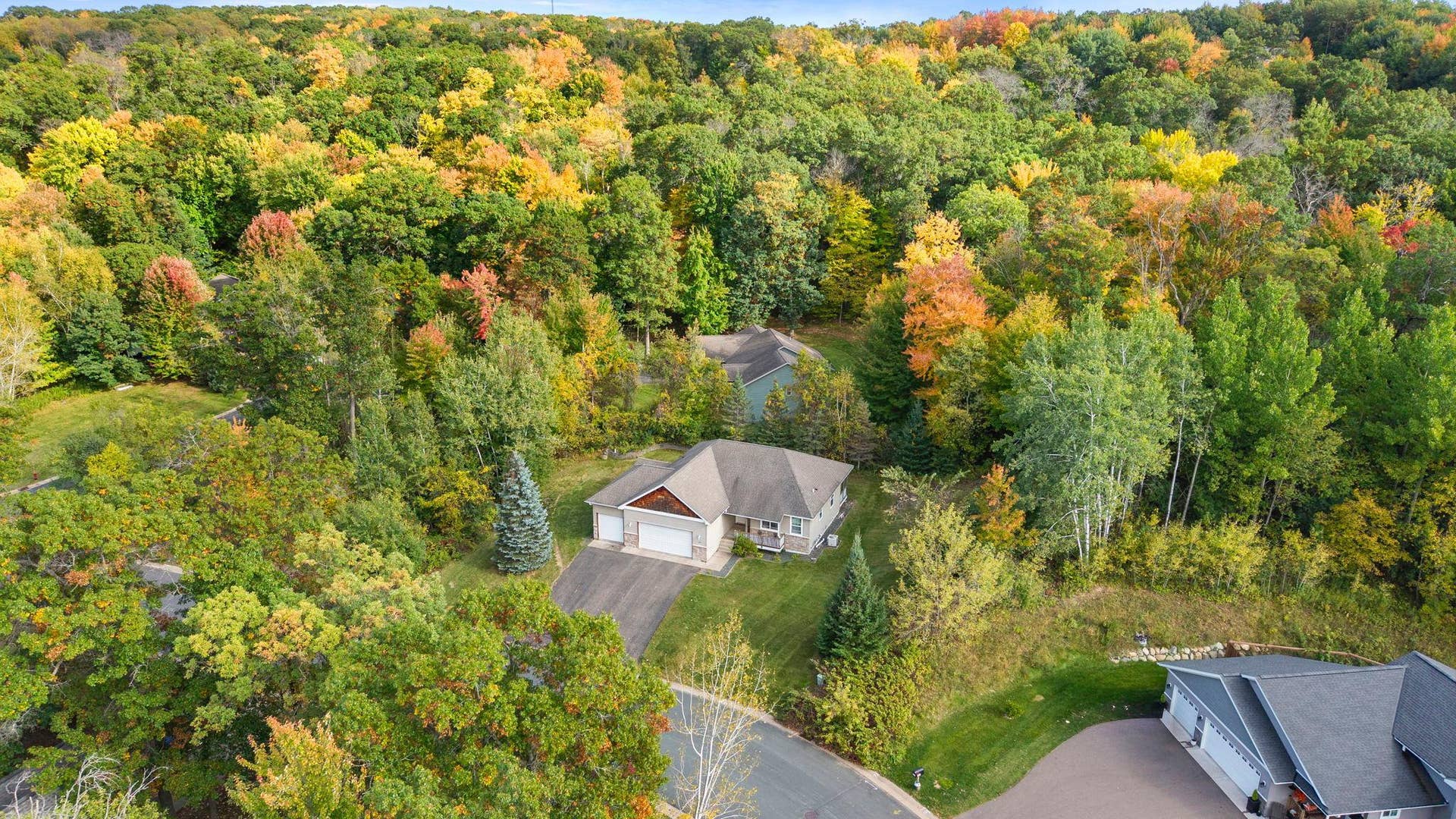 449 Roosevelt Drive, Dresser, WI 54009 Colorful, mature trees surround this home