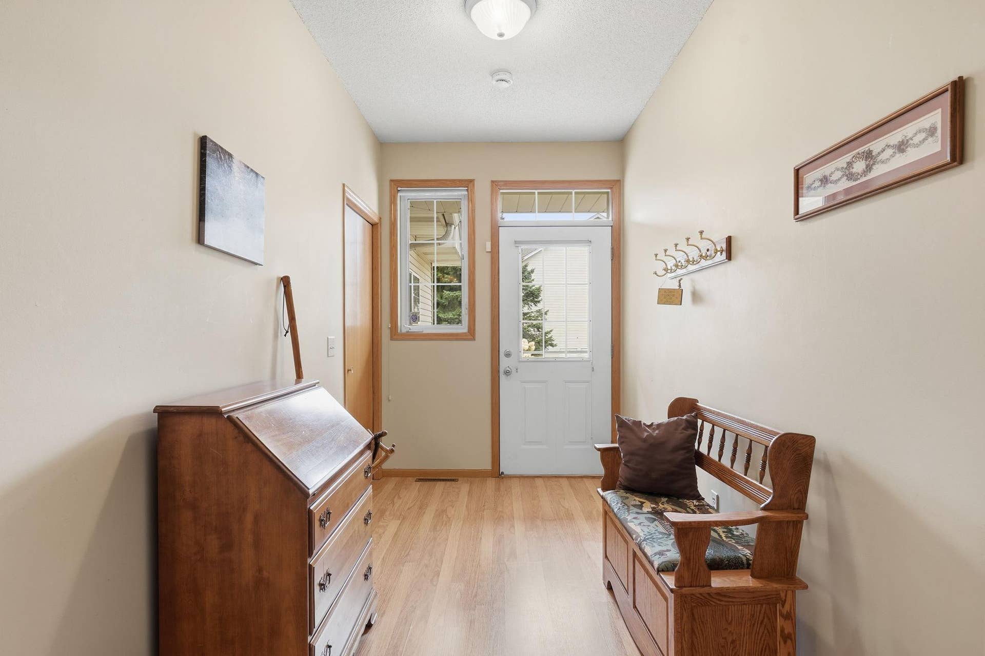 Sunny west-facing foyer is a cheery welcome to guest