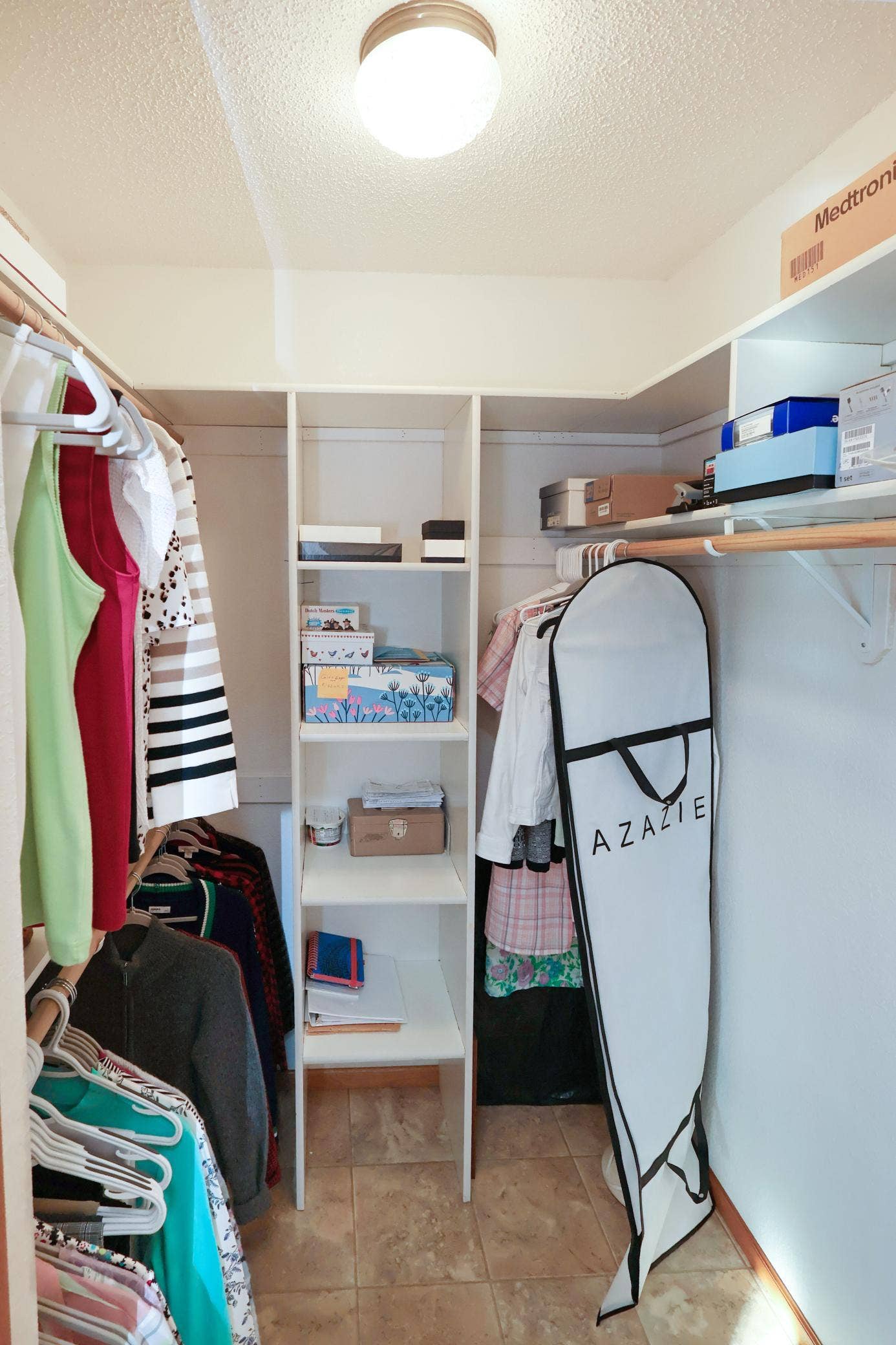 Primary bedroom walk-in closet.