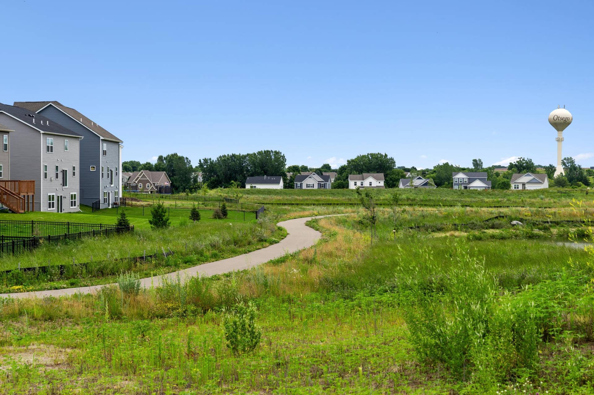 15810 73rd Court NE, Otsego, MN 55330 Get your steps in on the walking trail and enjoy the beauty of your new community!