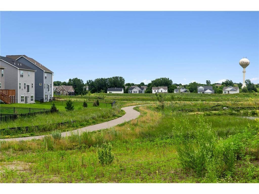15809 73rd Court NE, Otsego, MN 55330 Get your steps in on the walking trail and enjoy the beauty of your new community!