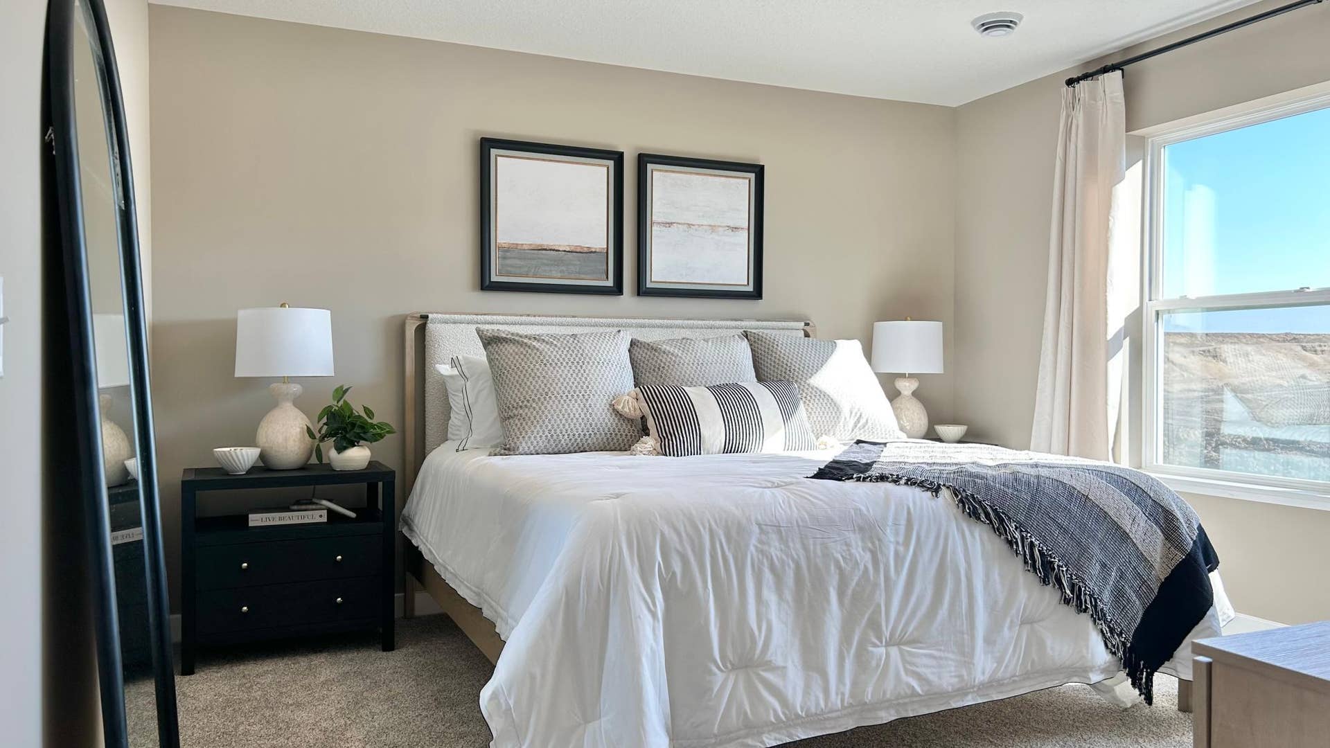 859 Stoneridge Parkway, Dundas, MN 55019 Spacious primary suite with private bath and walk-in closet. Photo of model home. Colors and finishes may vary.
