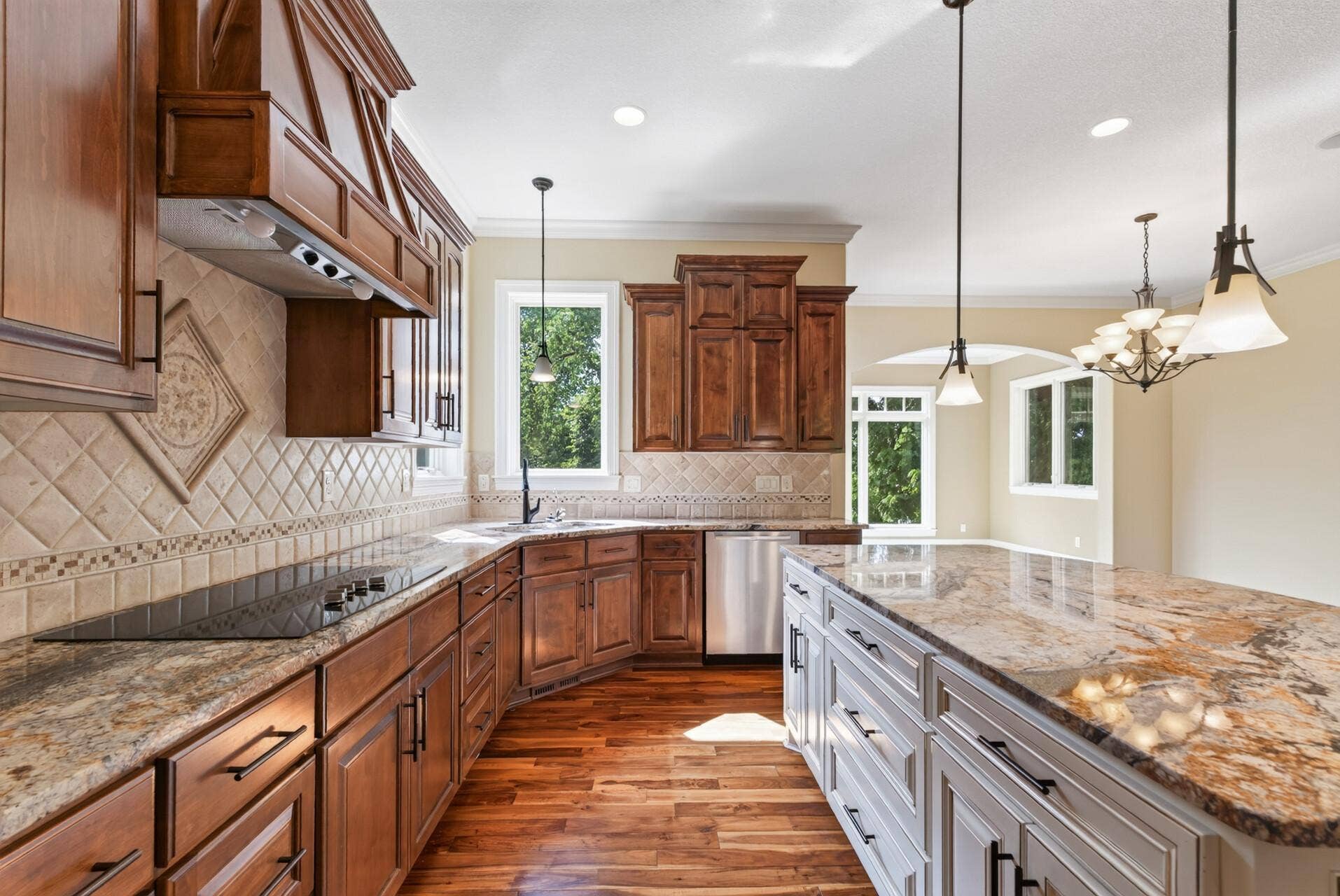 A kitchen with the scale, quality and thoughtful details expected in a builders own residence.