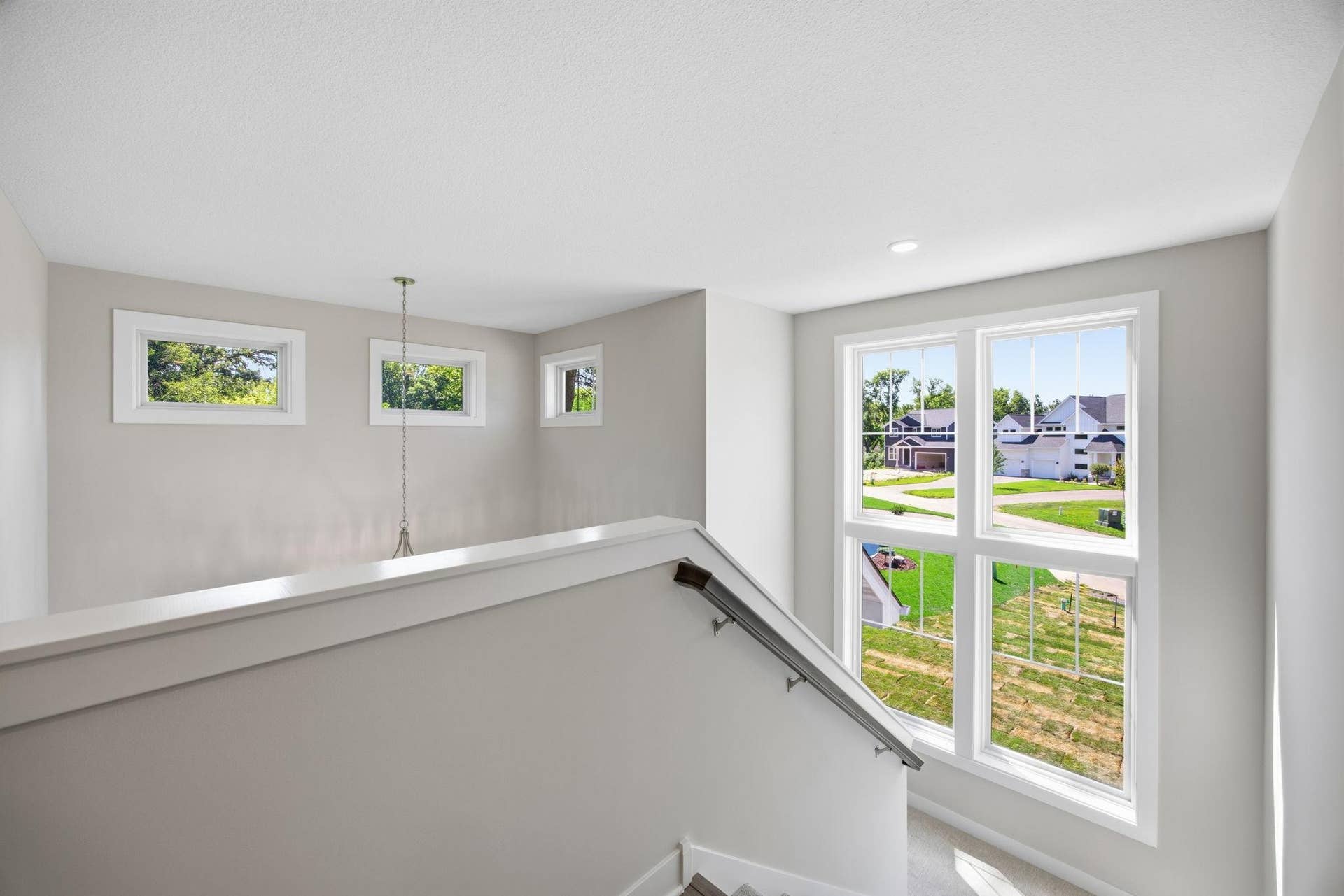 2399 Laurie Court W, Roseville, MN 55113 Wide staircase providing access to the second floor.
