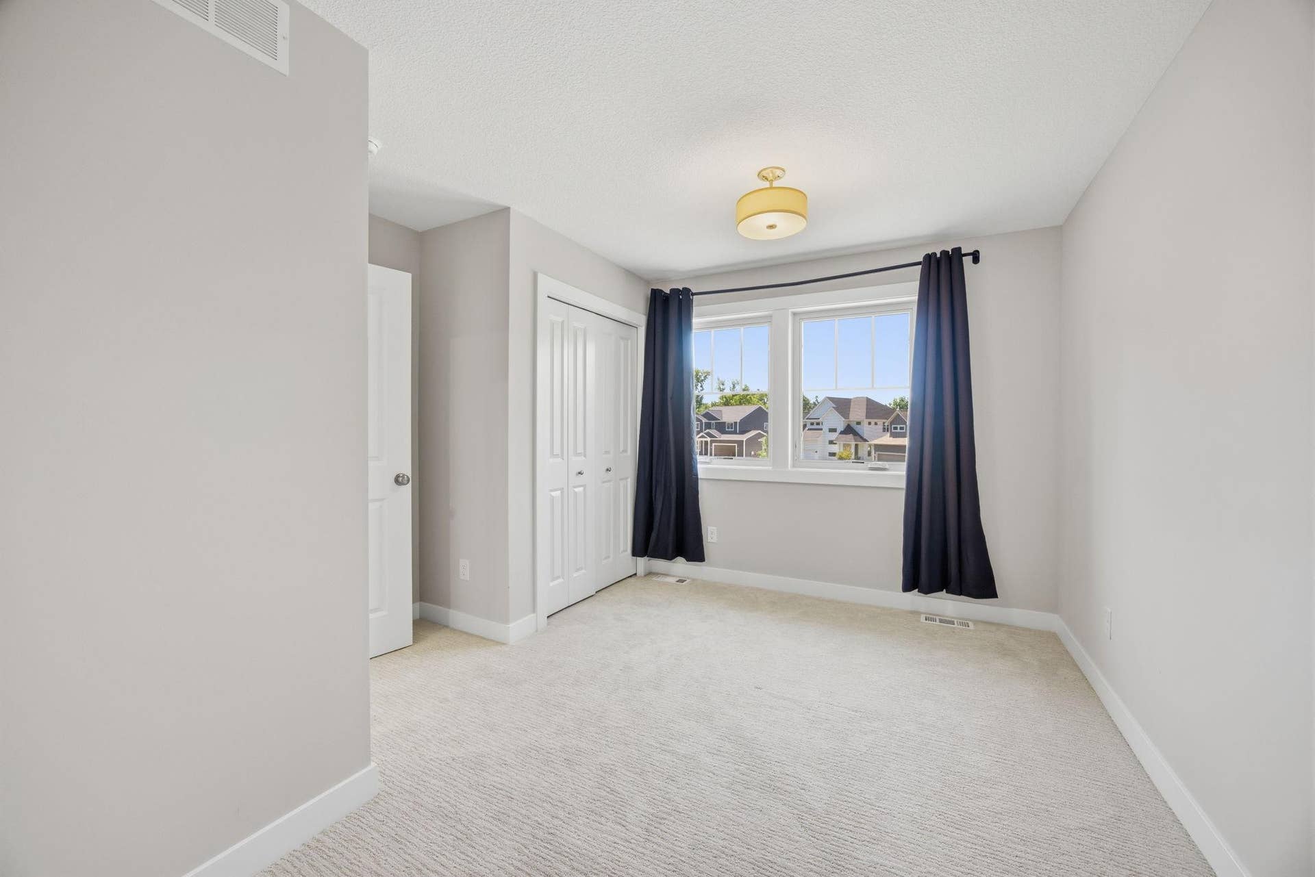 2399 Laurie Court W, Roseville, MN 55113 Another View of the Upper-Level Bedroom #3 Featuring Generous Space and Natural Light
