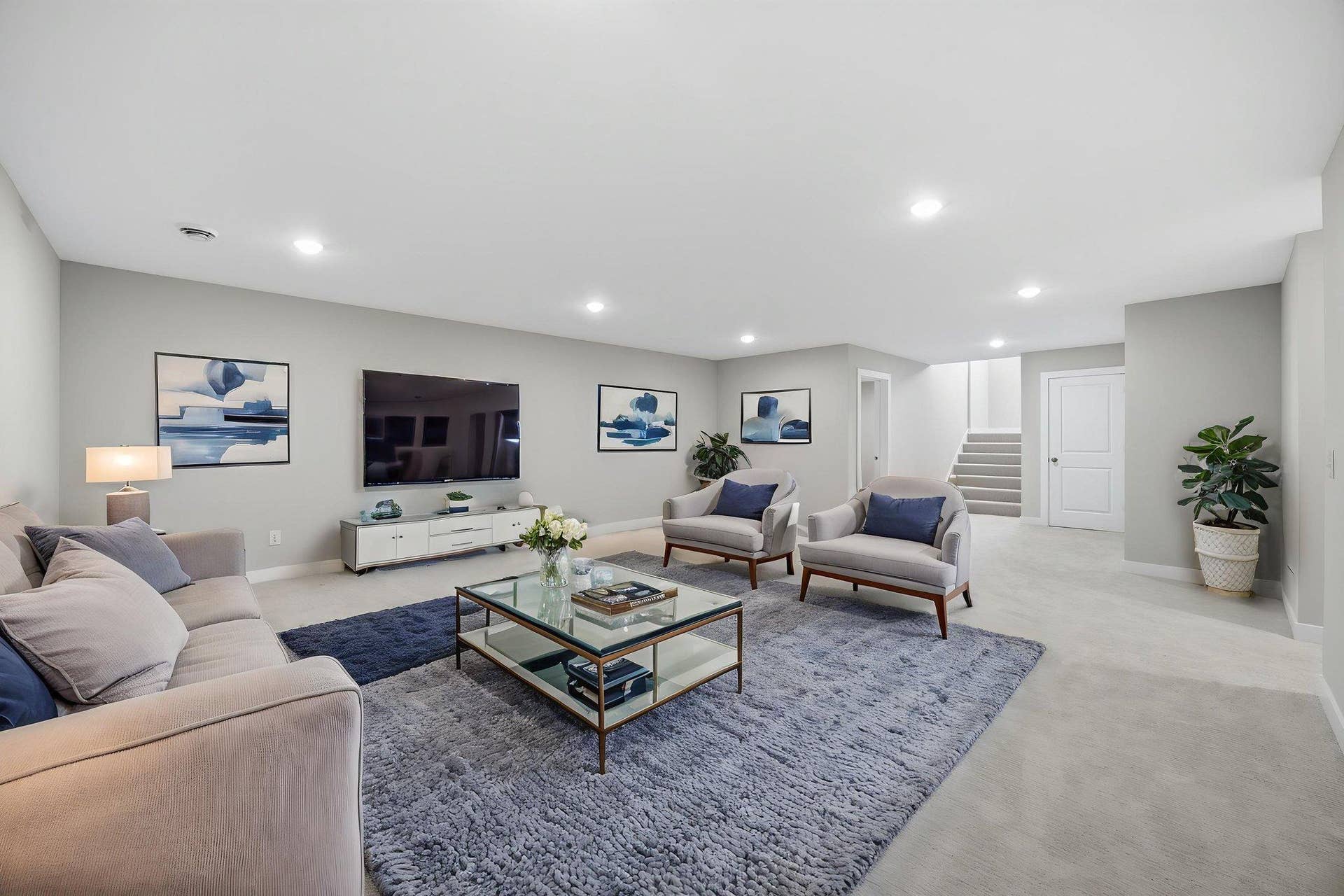 2399 Laurie Court W, Roseville, MN 55113 The finished lower level features a large family room with plenty of space for entertainment and relaxation. Professionally Virtually Staged.