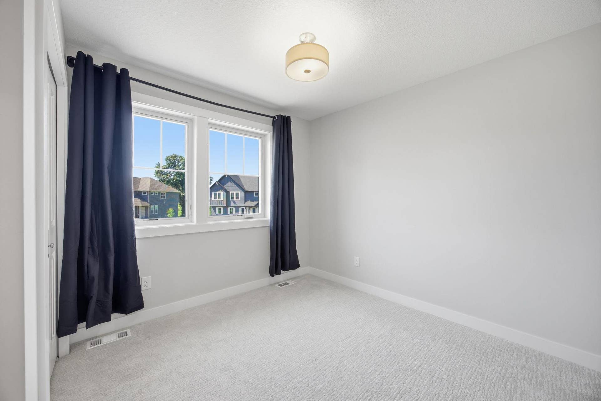 2399 Laurie Court W, Roseville, MN 55113 Upper-Level Bedroom #3 Featuring Generous Space and Natural Light