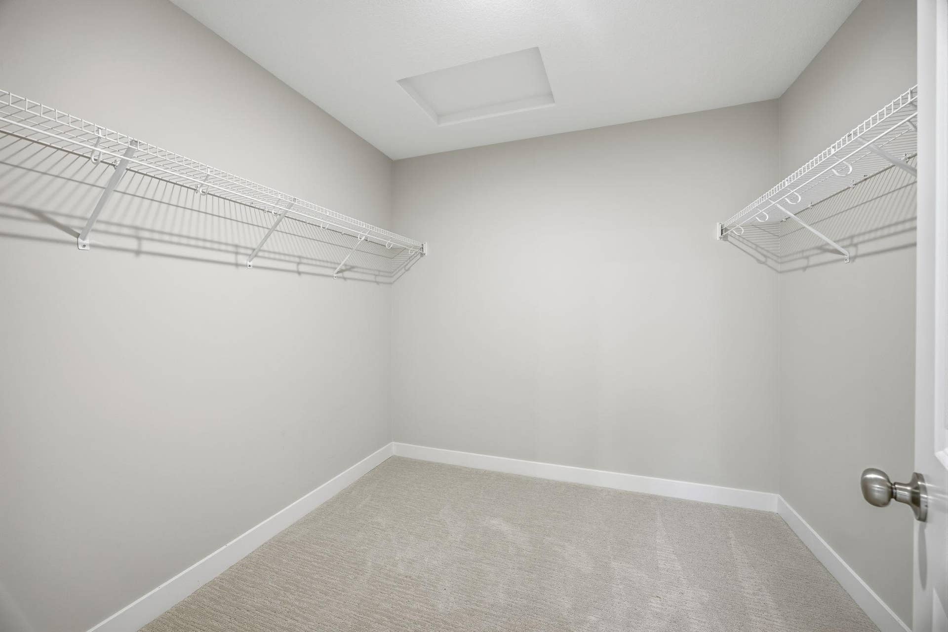 2399 Laurie Court W, Roseville, MN 55113 Large walk-in dressing room providing exceptional wardrobe storage.