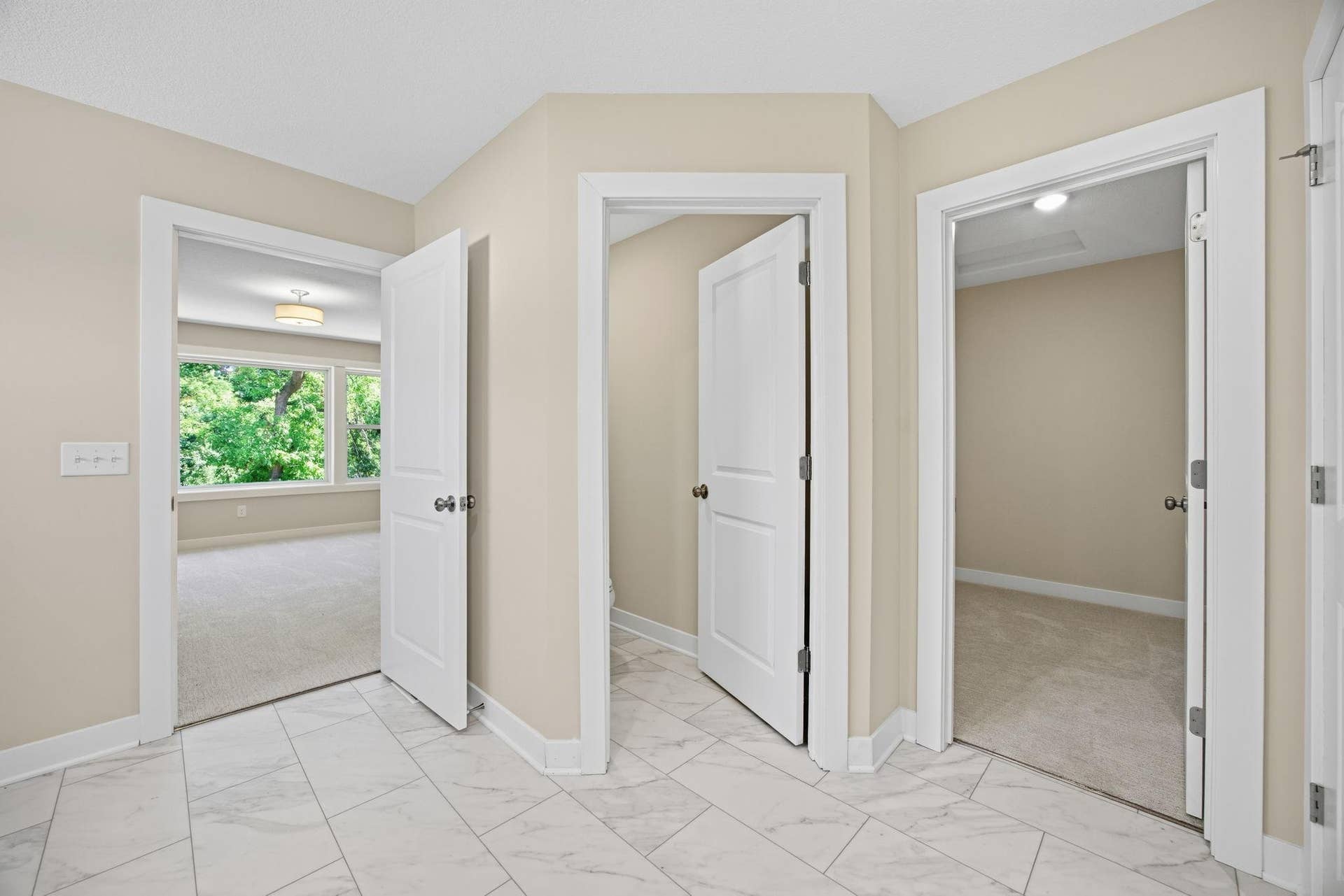 2399 Laurie Court W, Roseville, MN 55113 The primary bath provides direct access to the private toilet area and spacious walk-in dressing room.