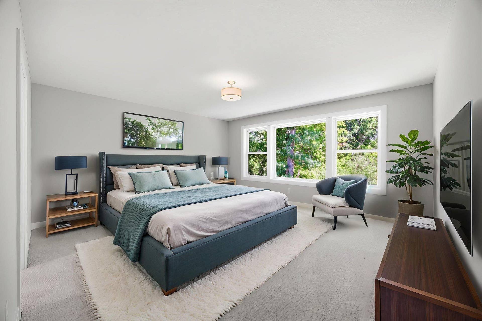 2399 Laurie Court W, Roseville, MN 55113 The luxurious primary suite offers a private spa-like bath with a walk-in shower, soaking tub, dual vanities, and 9x8 walk-in dressing room. Professionally Virtually Staged