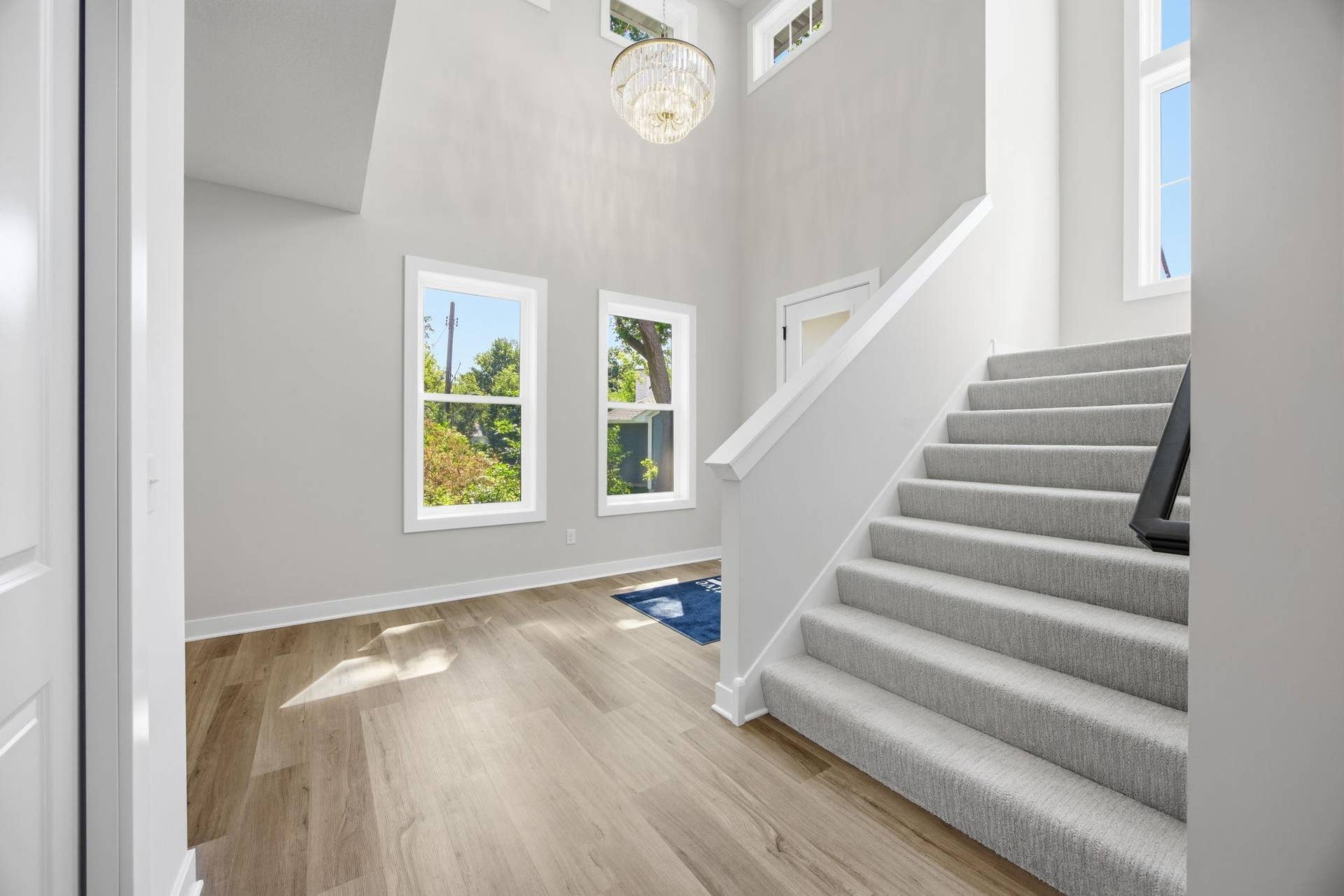 2399 Laurie Court W, Roseville, MN 55113 The spacious staircase provides an elegant transition to the second floor.