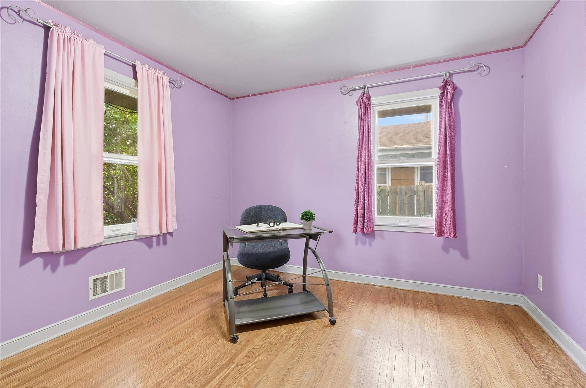 4840 N 6th Street, 41, Minneapolis, MN 55430 Bedroom #3 highlights the hardwood flooring, spacious closet, and versatile layout with room for bedroom furniture or a home office setup.