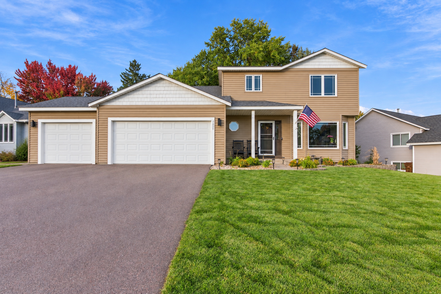9078 Sierra Road, Woodbury, MN 55125 Bright Suburban Home with Empty Driveway.png