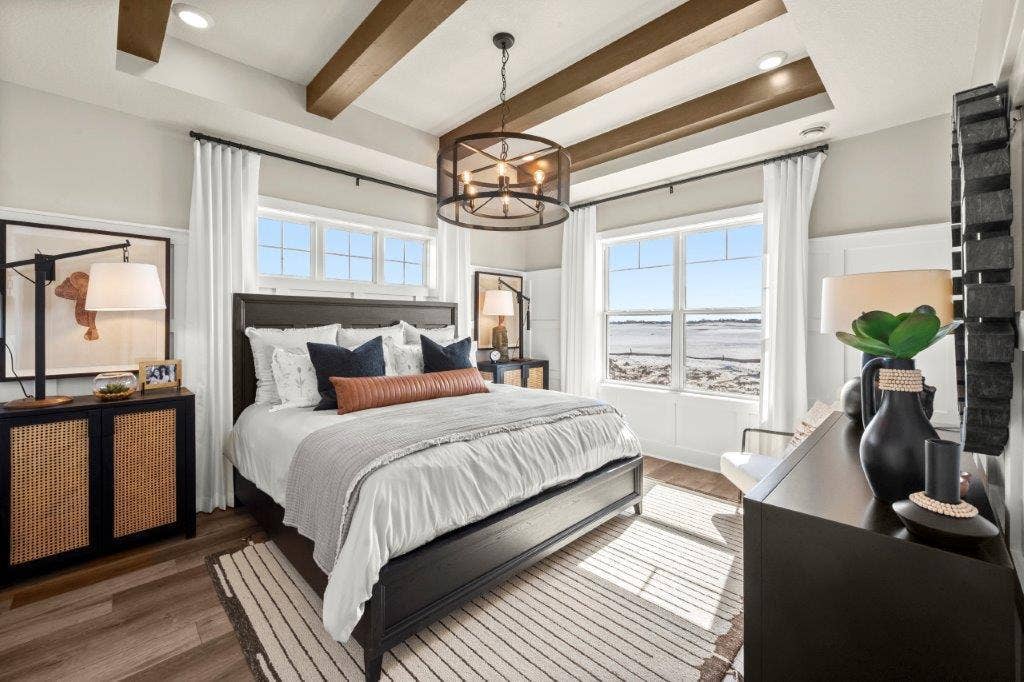 Owner's Suite: The Large windows bring in the morning light, check out the vaulted ceilings and trim deails-