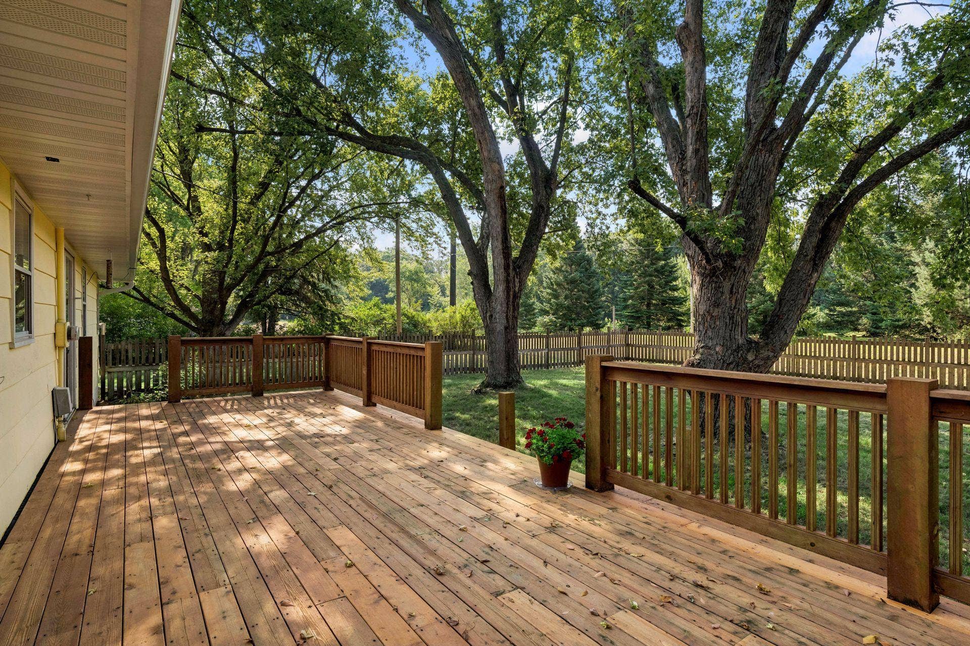 3308 173rd Lane NW, Andover, MN 55304 Over-sized deck overlooking the .75 acre lot
