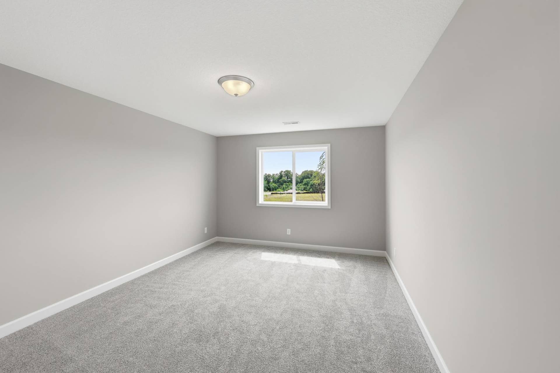 937 Kepler Avenue NE, Hanover, MN 55341 Finished Walkout Basement Bedroom 4 - The Madison at 937 Kepler Ave NE in Oakview Ridge!