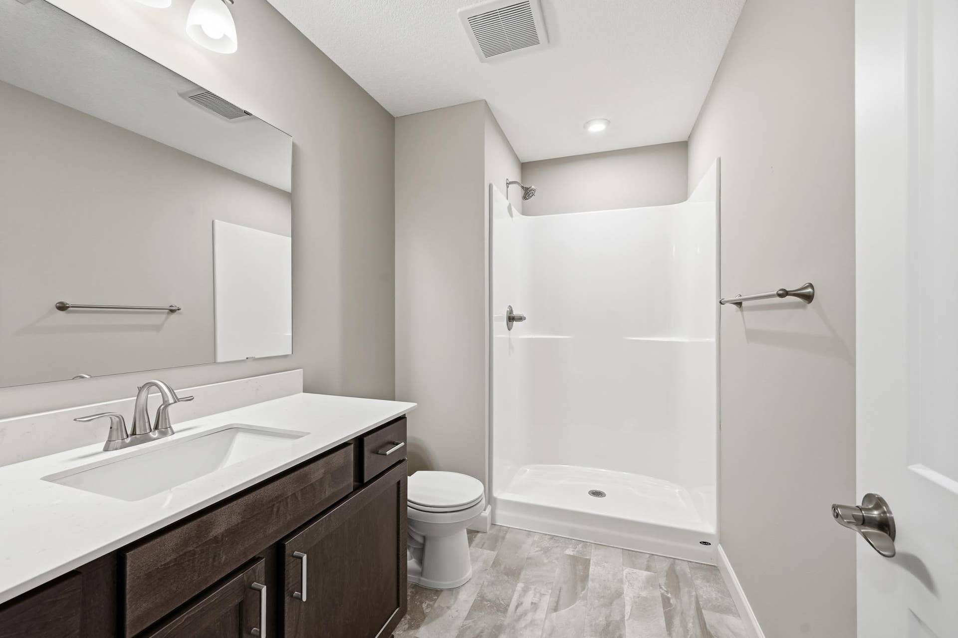 937 Kepler Avenue NE, Hanover, MN 55341 Finished Walkout Basement Hall Bath - The Madison at 937 Kepler Ave NE in Oakview Ridge!