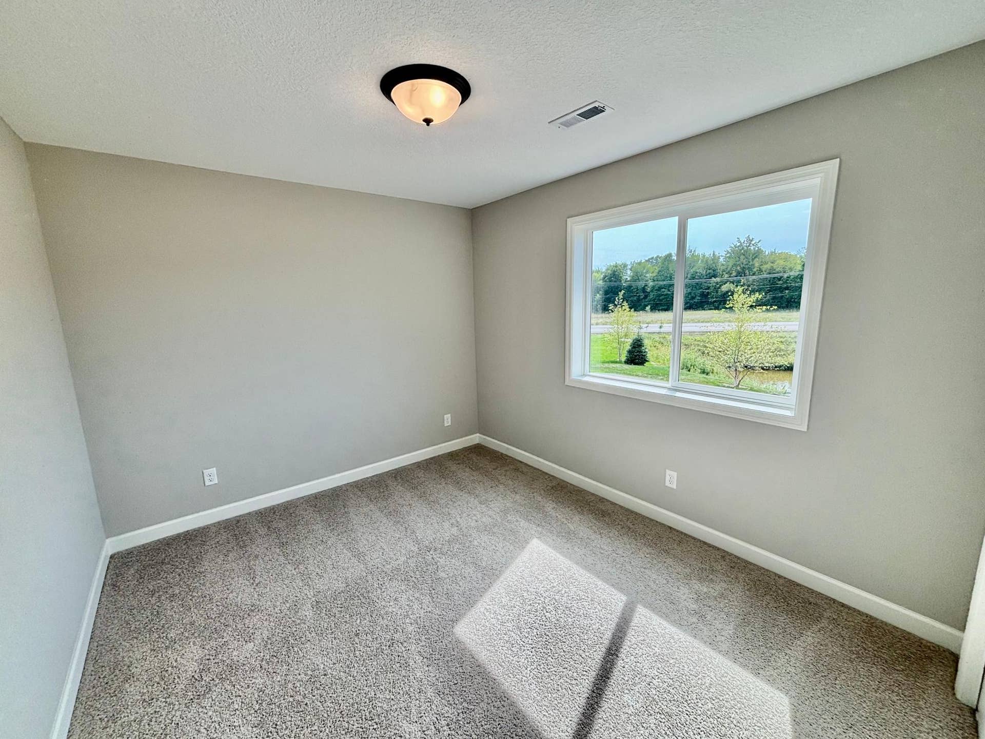 Finished Lower Level Bedroom 5 - The Weston C at 813 Walnut Grove Lane in Oakview Ridge!