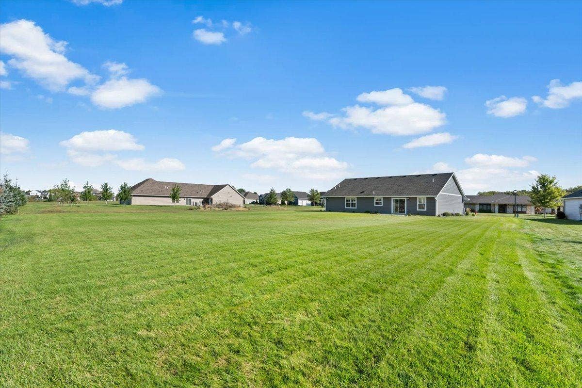 2063 Sandstone Loop N, Sartell, MN 56377 Half acre lot w/established lawn