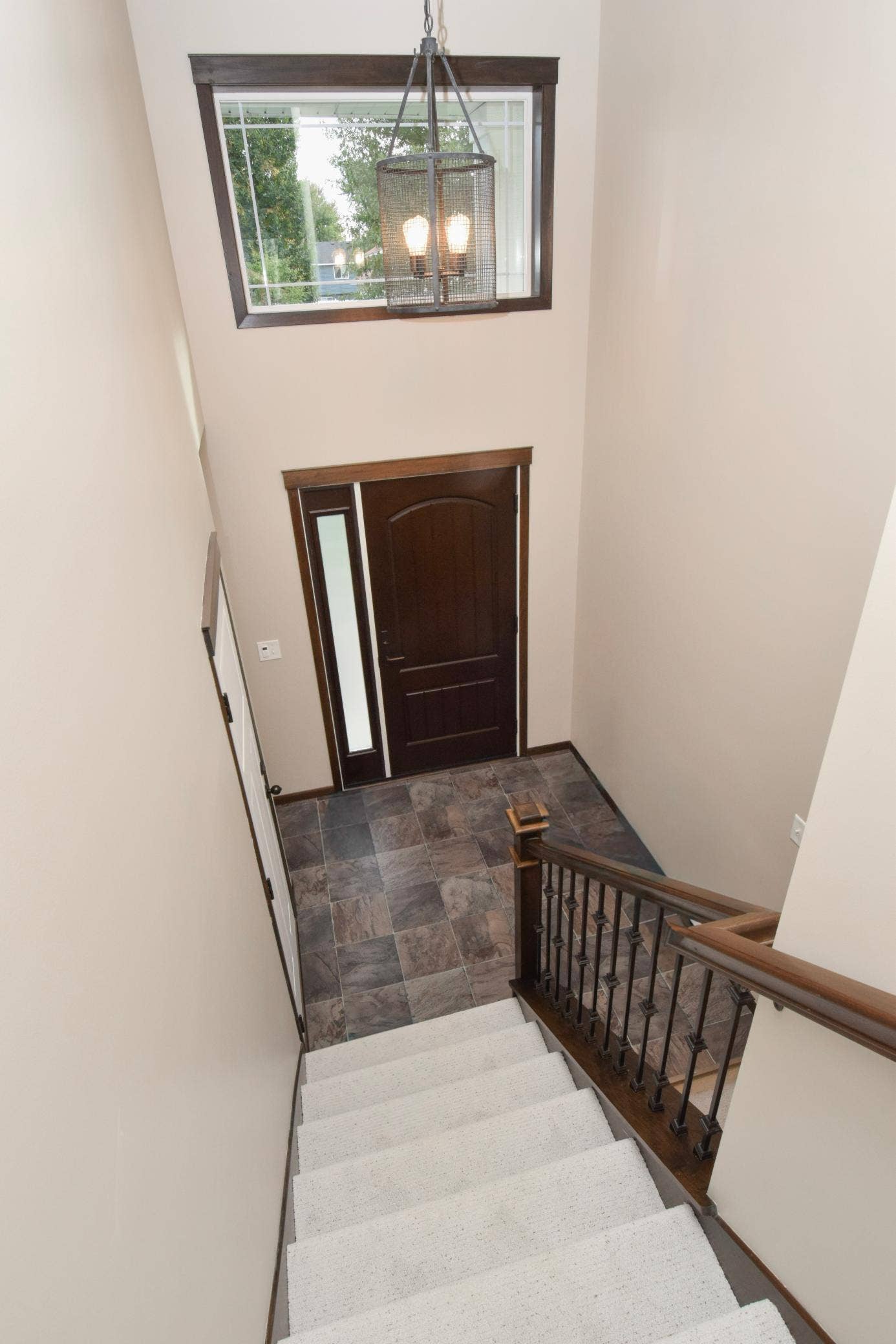 Welcome Home! All New Paint All New Carpet & Pad Throughout Entry and Main Level! Lower is JUST Finished-Bath NEVER Used!!!