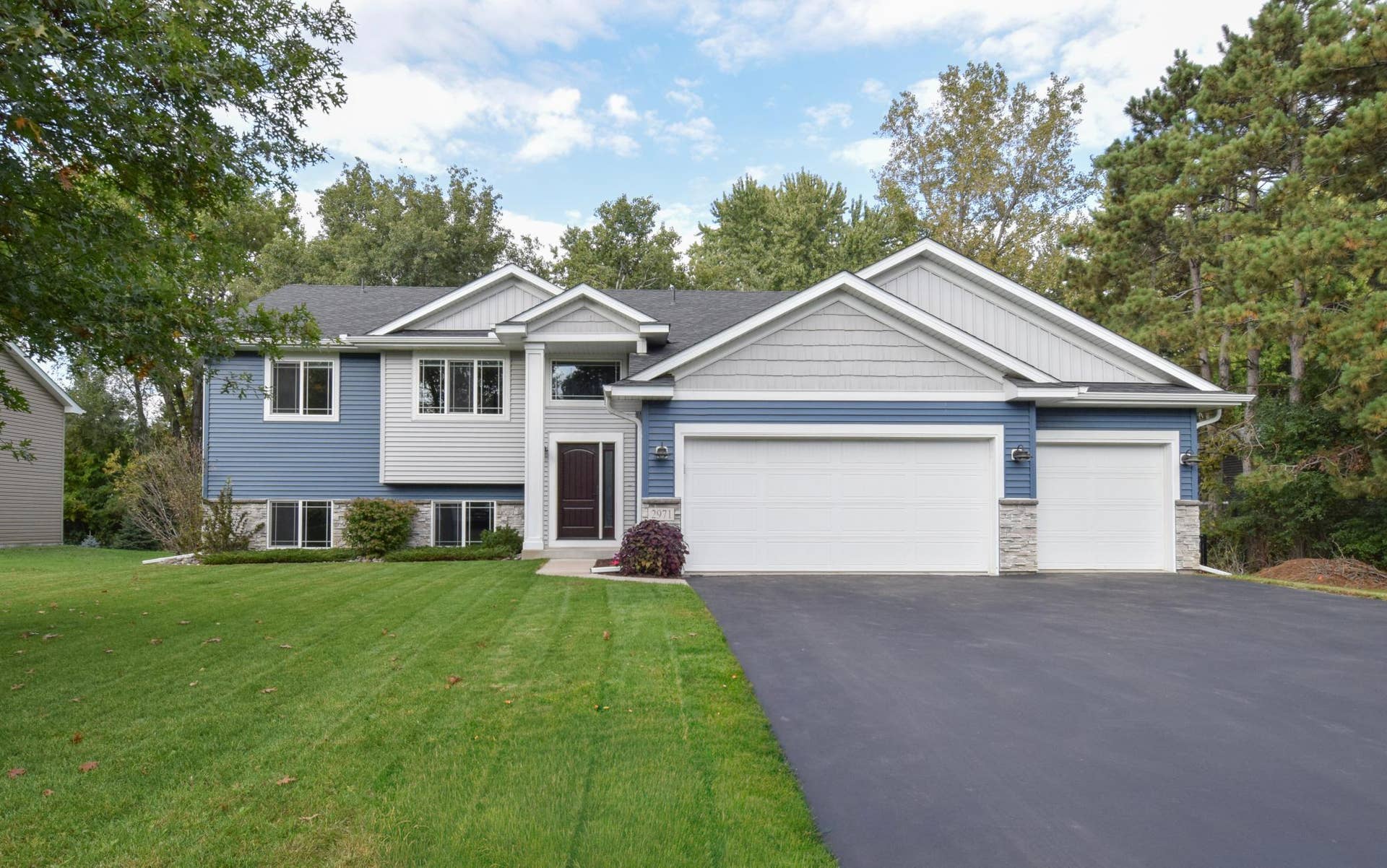 Welcome to 2971 91st Ave NE Just 7 Years Young With a NEWLY Finished Lower Level & New Paint & Pad/Carpet on Main Level-Shows Like NEW!!!