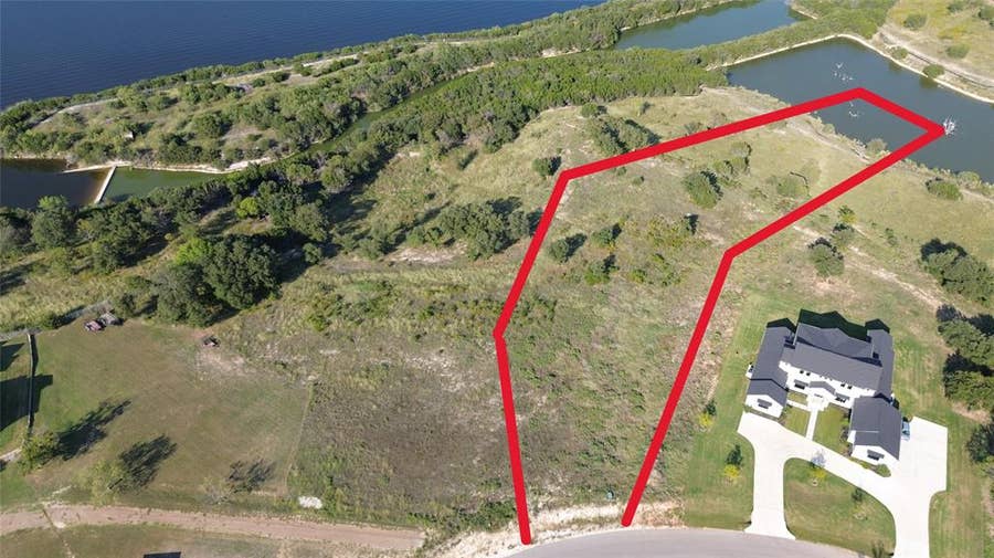 Property photo for 735 R C Luker Court, Granbury, TX