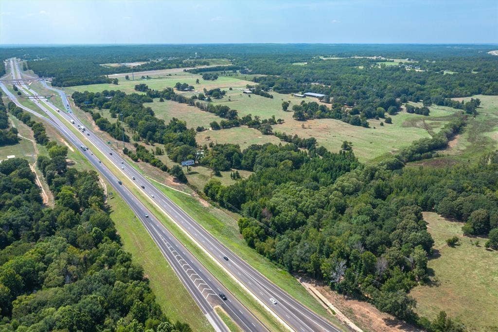 TBD Interstate 20, Lindale, TX 75706 Aerial view with a forest view